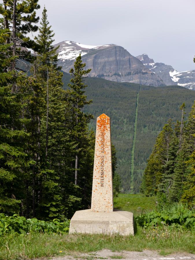 P1010593.jpg - Canadian border. Glacier NP to the left, Waterton Peace Park to the right.