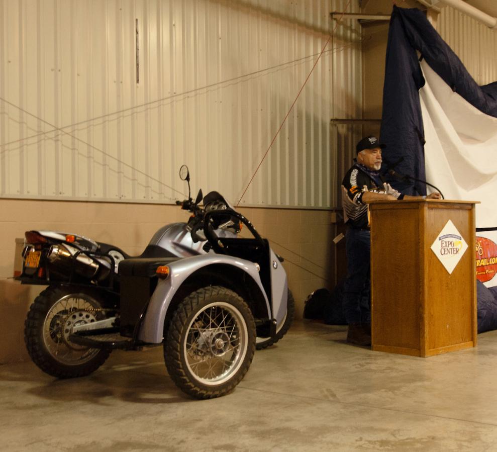 P1010970.jpg - Ramey “Coach” Stroud provided a very inspirational keynote address. "Jump high, fart loud, fear nothing." Though disabled he continues to desert race his F650.