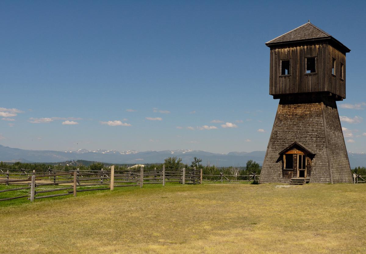 P1010855.jpg - The old water tower and a view of the mountains beyond.