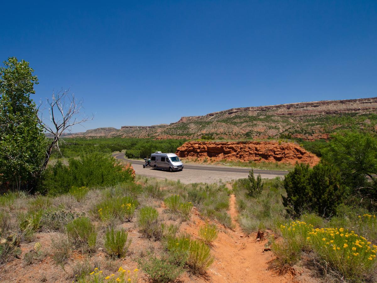 P1010214.jpg - Our Sprinter and BMW R1200GS rig as we approach our first scenic stop, Palo Duro Canyon in Texas.