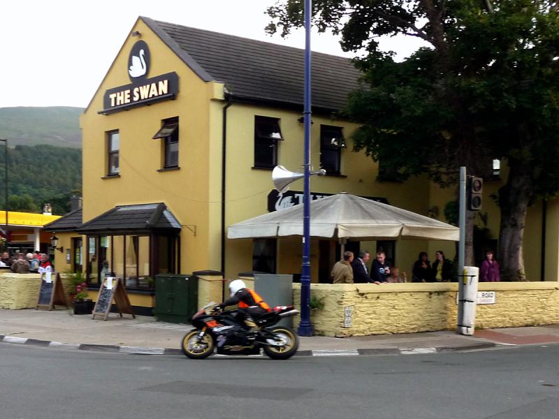 P1010640.JPG - Thursday evening practice; a modern 600 passes The Swan pub.