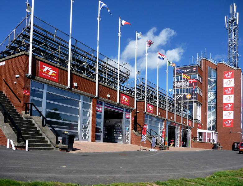 P1010765.JPG - Back side of the grandstands; souvenir shops, parts and service vendors.