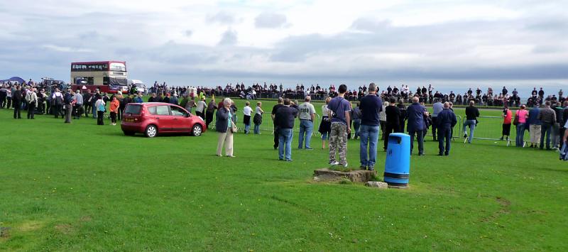 P1020345.JPG - The Ramsey Sprints. The bus serves as HQ, the sprint is 1/8 mie along the seaside.
