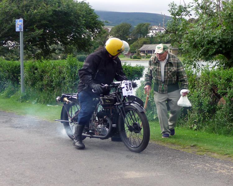 P1020347.JPG - Friendly interaction of locals and enthusiasts is a hallmark of the island.