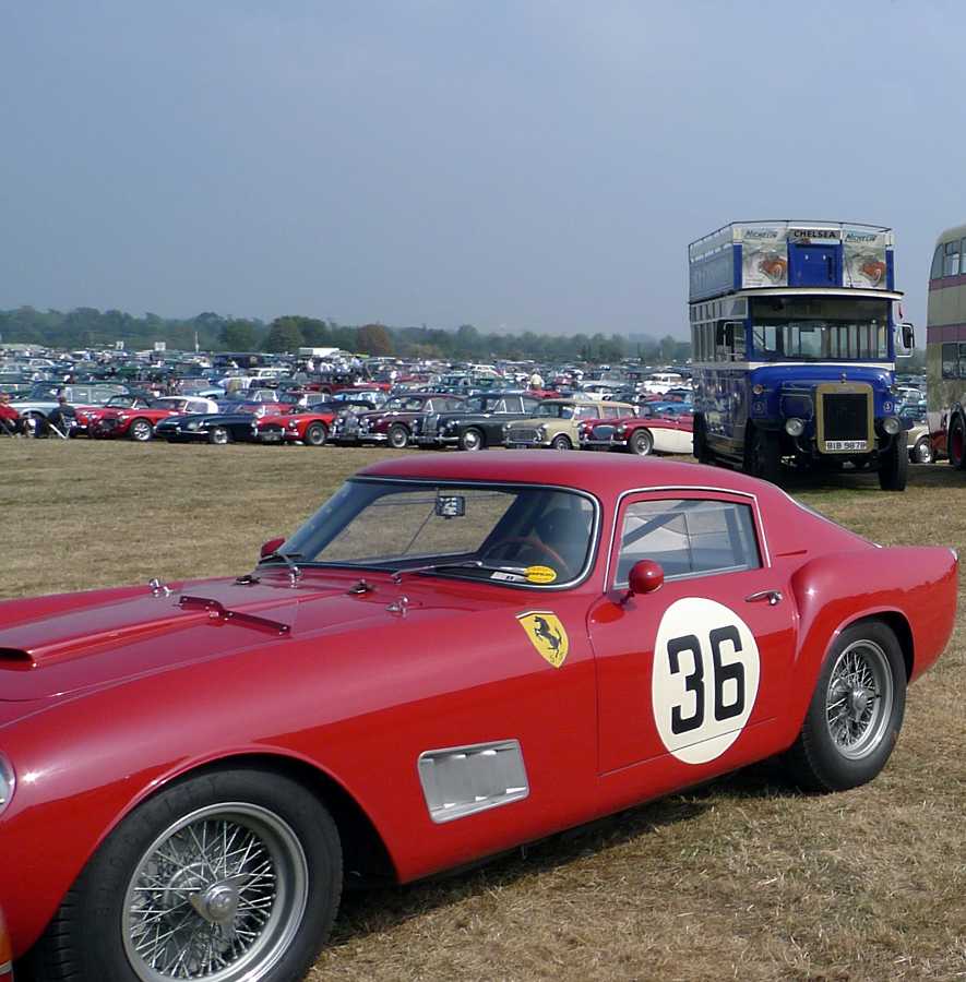 L1010717.JPG - Nearby, a late fifties Ferrari Tour de France coupe, the spectator lot in the background.
