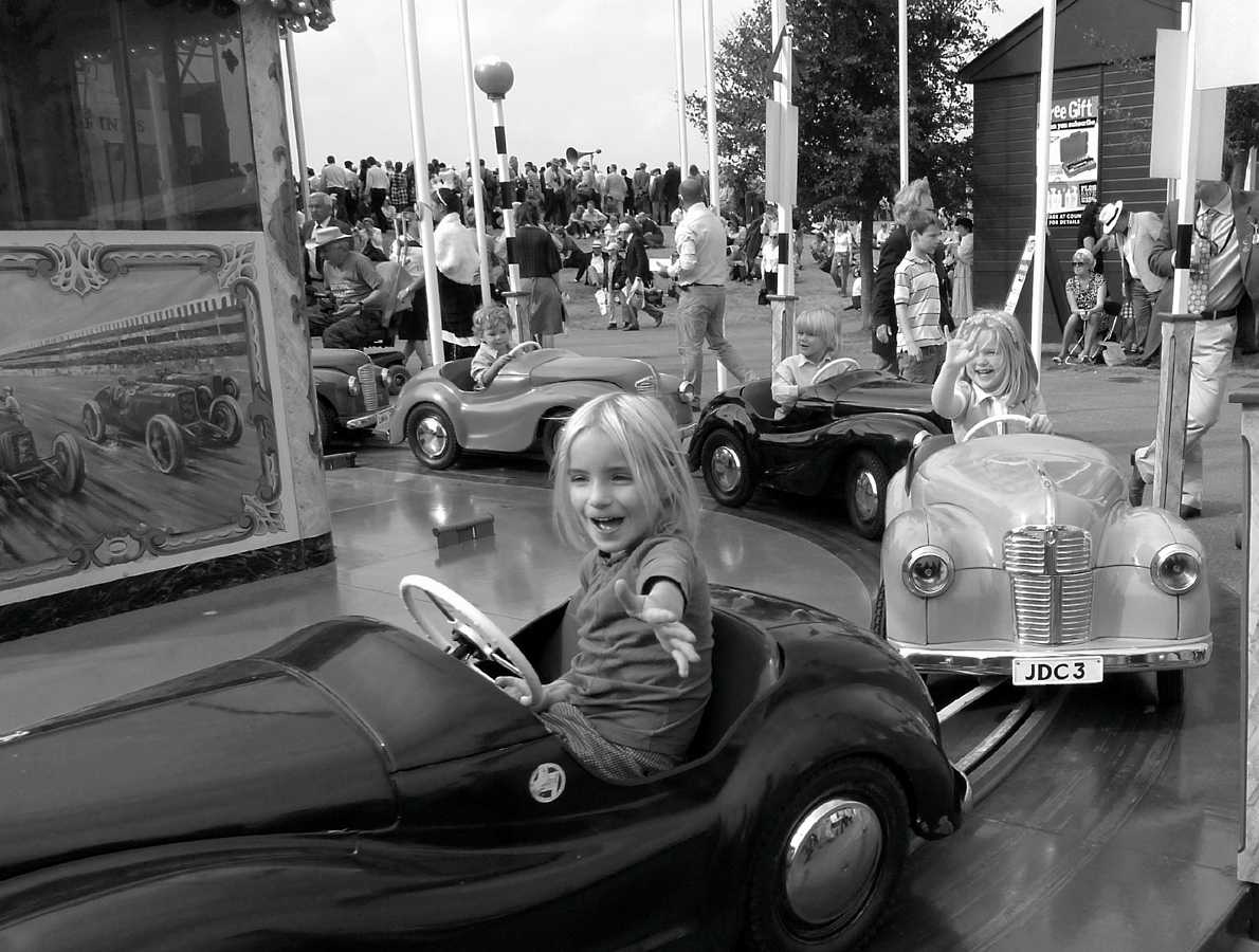 L1010761.JPG - Kids at the retro amusement park, complete with A40 Austin bumper cars.