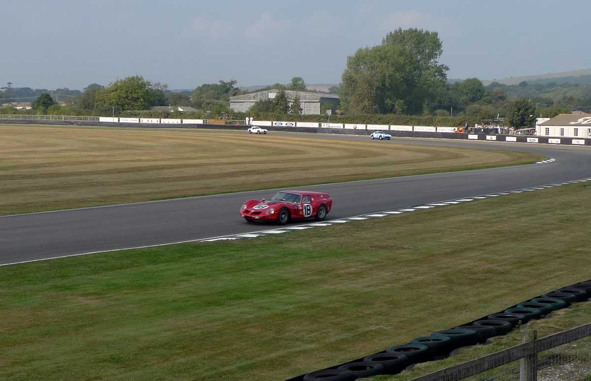 L1010726.JPG - The lead car here is the last Ferrari GTO built ahead of a another Ferrari, a SWB 250 GT, and an FIA Cobra 289.